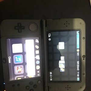 Nintendo 3DS, with Pokemon Moon.